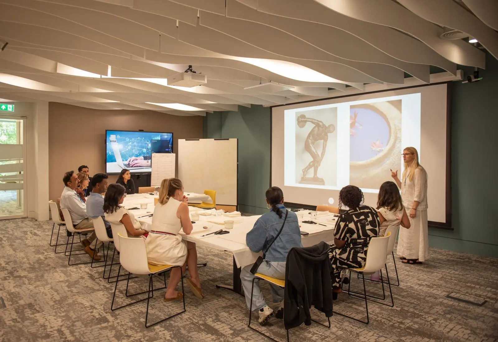 A corporate group participating in a Sumi-e workshop