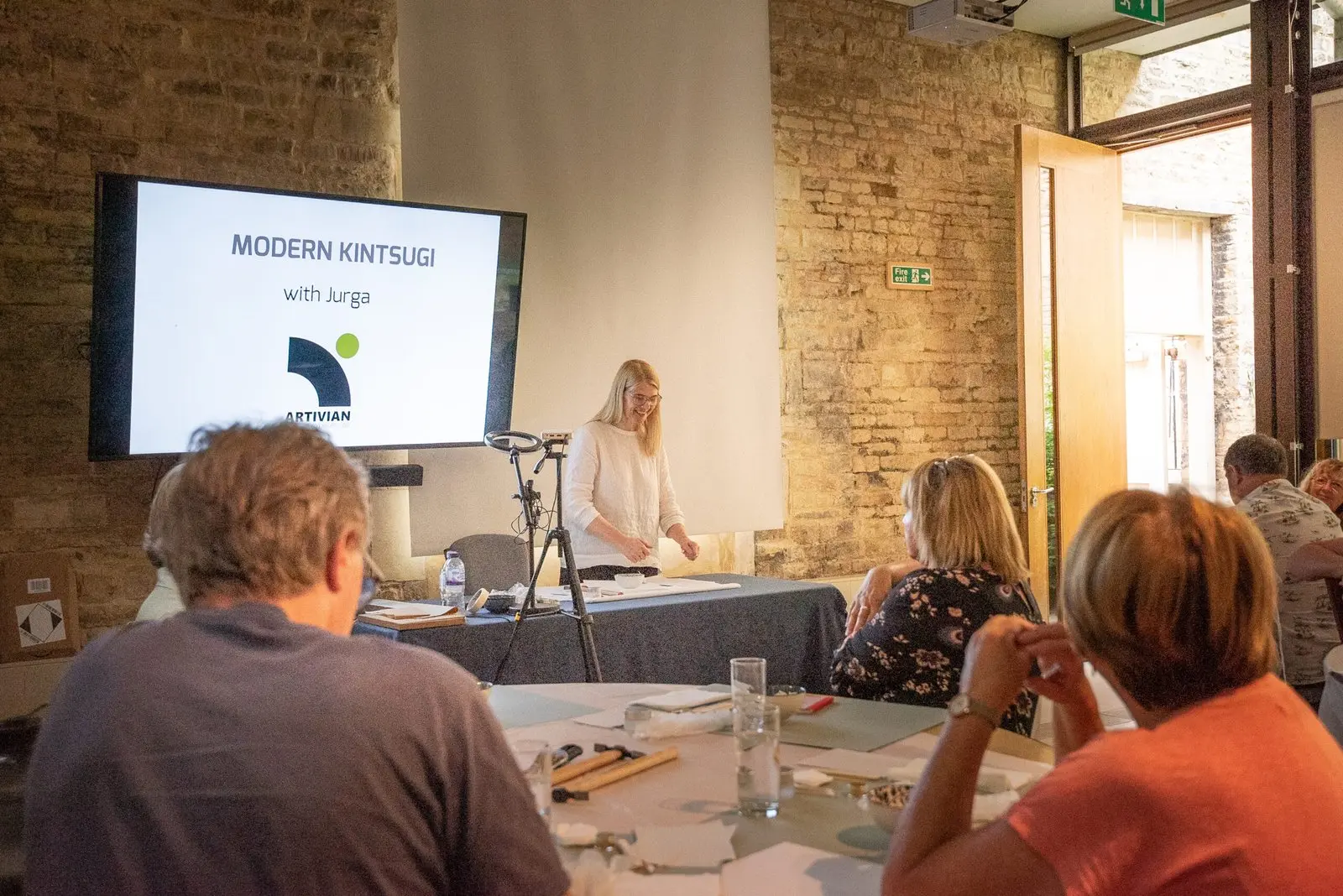 Jurga leading a Kintsugi workshop during a corporate away day