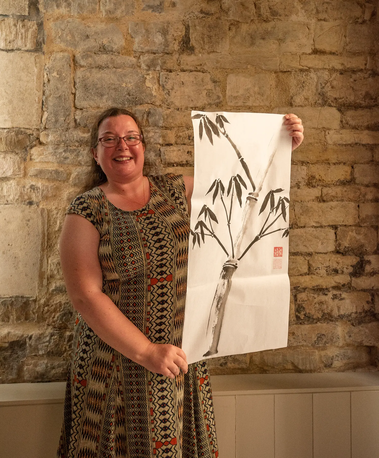 Sumi-e brushes, ink and paper prepared for a workplace wellbeing workshop